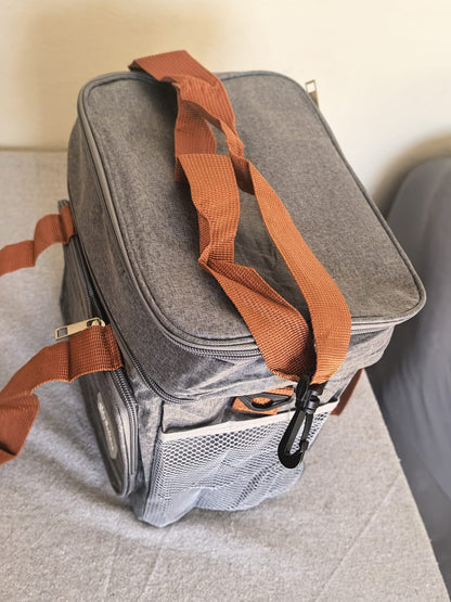 Grey two-tier insulated lunch bag with brown shoulder strap