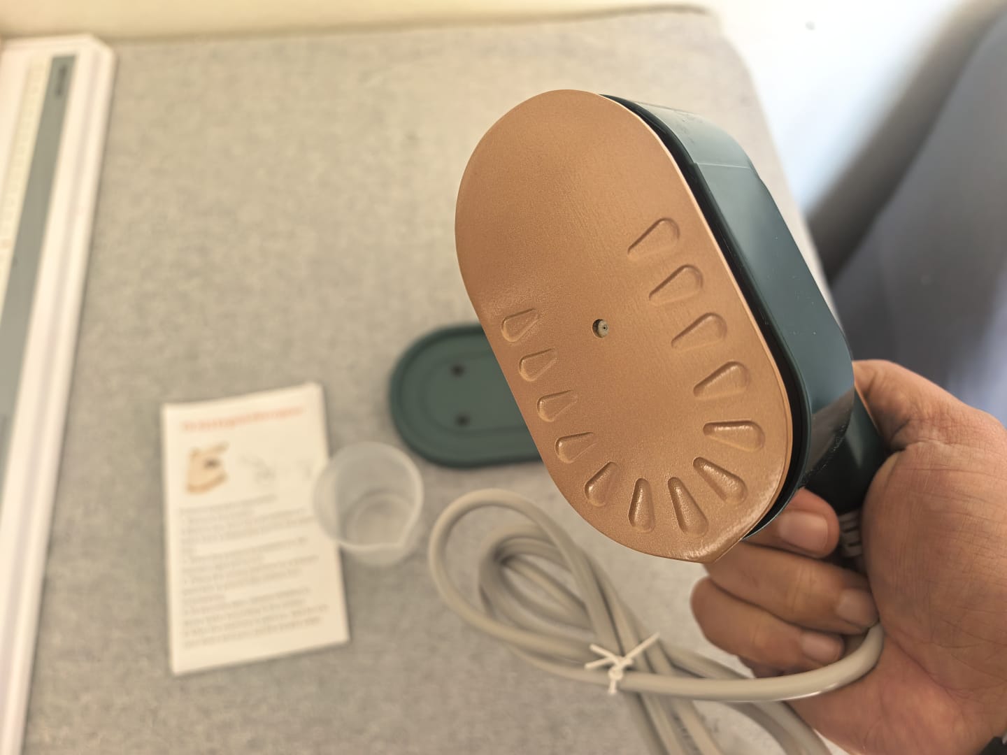 Close-up of the compact mini iron soleplate