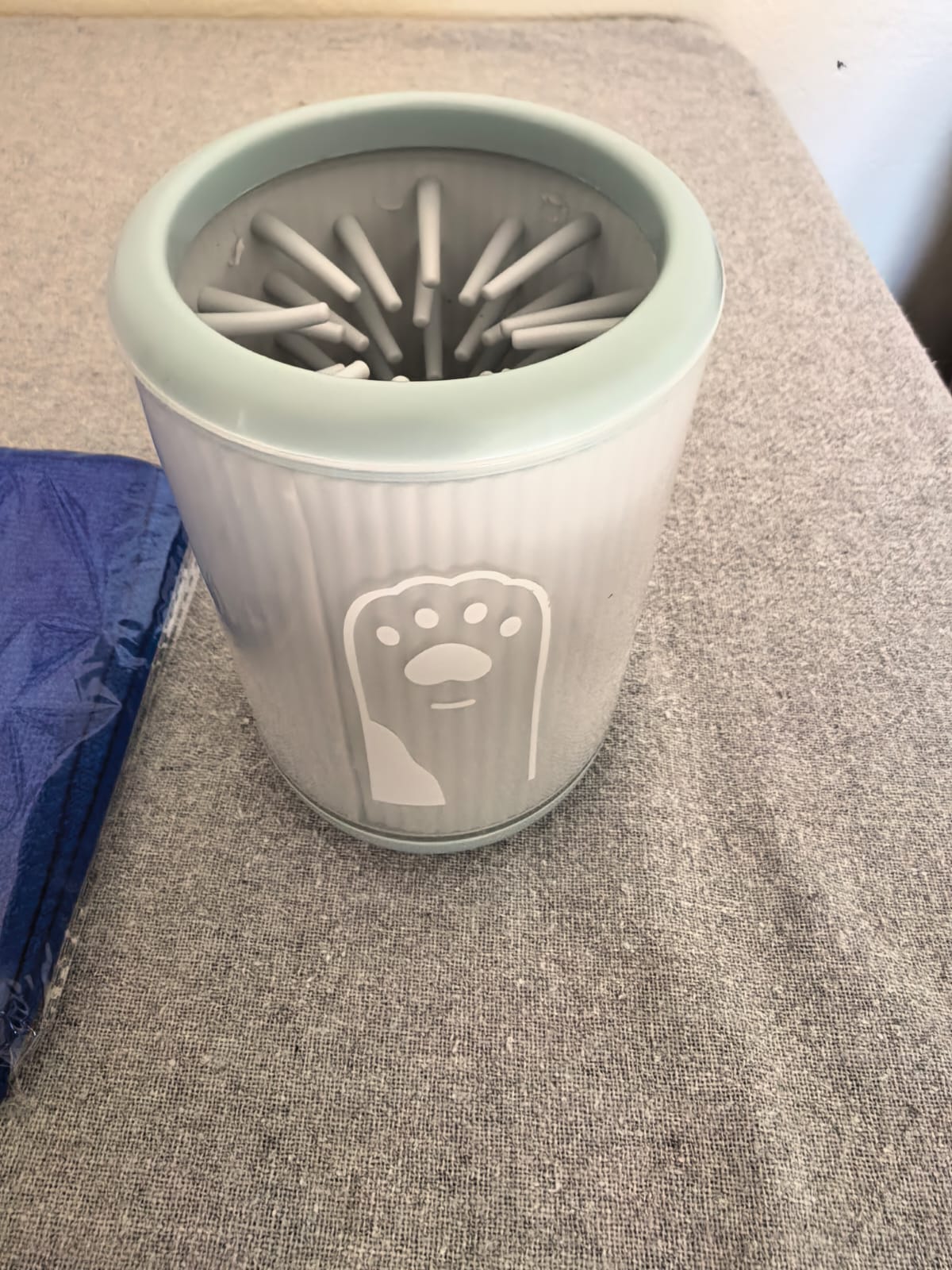 Mint green 2-in-1 dog paw washer cup with silicone cleaning bristles