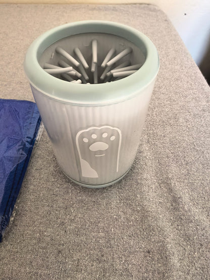 Mint green 2-in-1 dog paw washer cup with silicone cleaning bristles