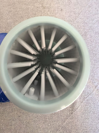 Close-up of the soft silicone paw-cleaning bristles inside the washer