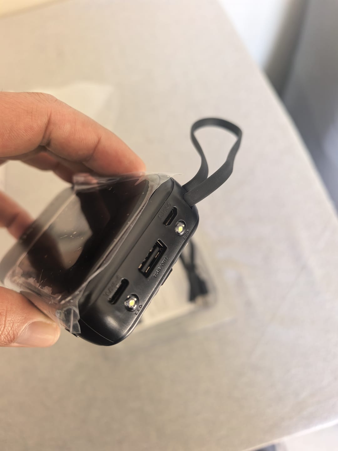 USB-C input, USB output and LED lights on the 10000mAh power bank