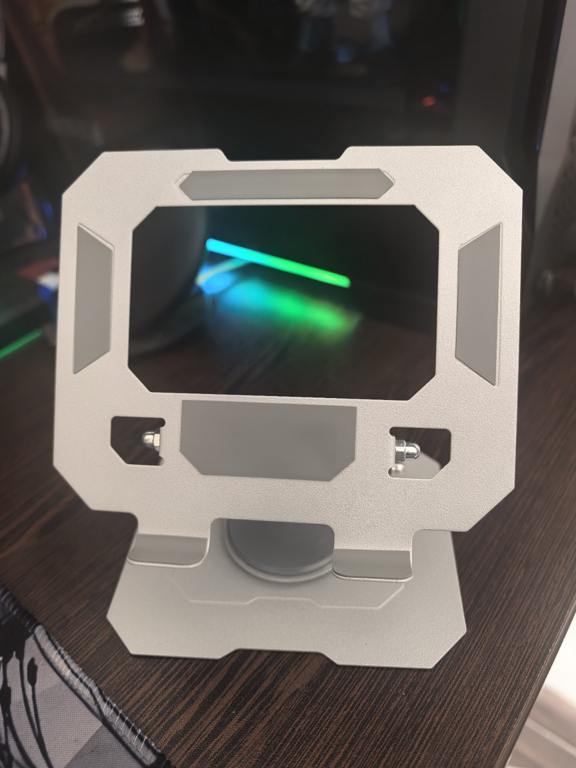 Real product photo of the VibeCart silver rotating tablet and phone stand