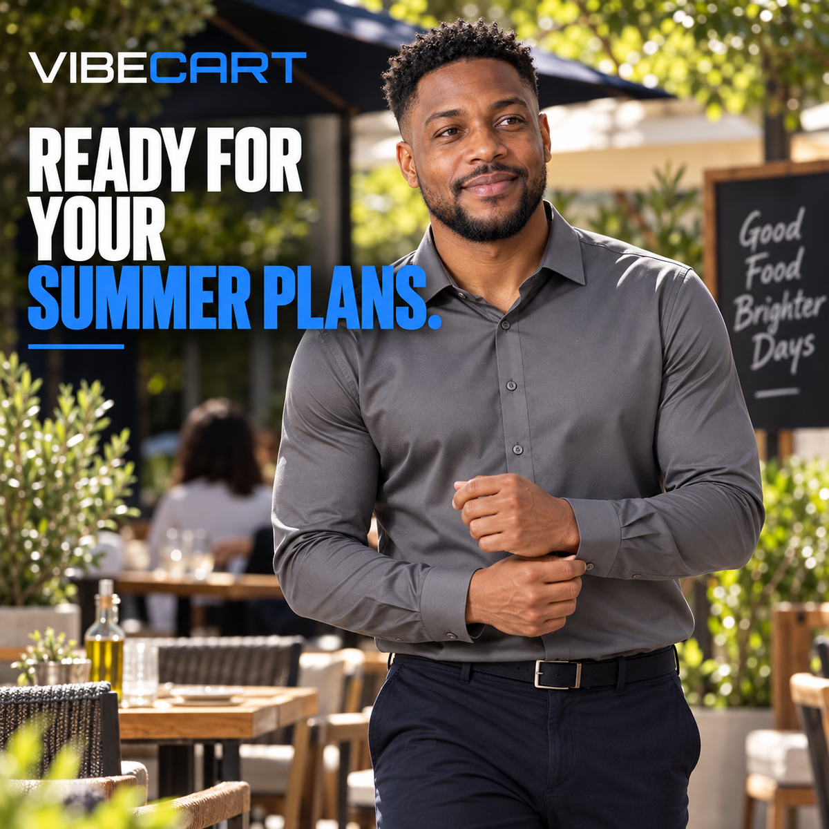 Thabo wearing a grey shirt at an outdoor restaurant